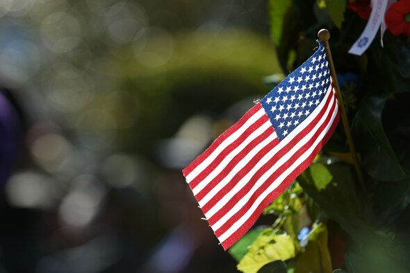 A flag rests in a memorial wreath during a Veterans Day Celebration ceremony in Sumter, South Carolina, Nov. 11, 2017.