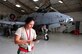 Senior Airman Amanda Gonzales, 924th Fighter Group crew chief, checks her technical orders before beginning maintenance on an A-10 Thunderbolt II in a hangar on Davis-Monthan Air Force Base.