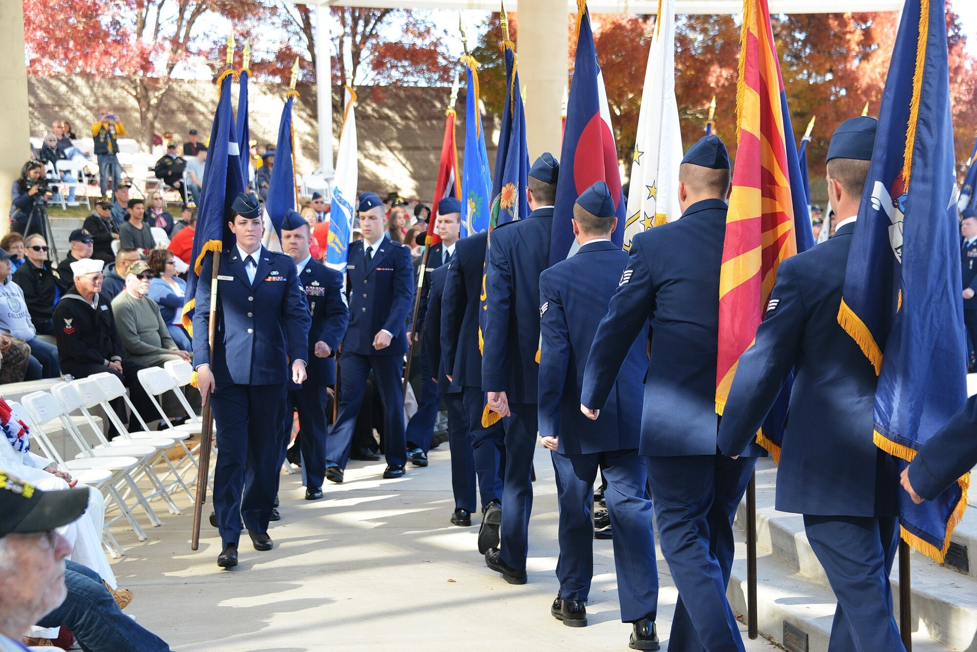 Kirtland Airmen parade the 50 state flags at the Veterans Day Ceremony Nov. 11 at the New Mexico Veterans Memorial. Past, present and future veterans were honored during the ceremony.