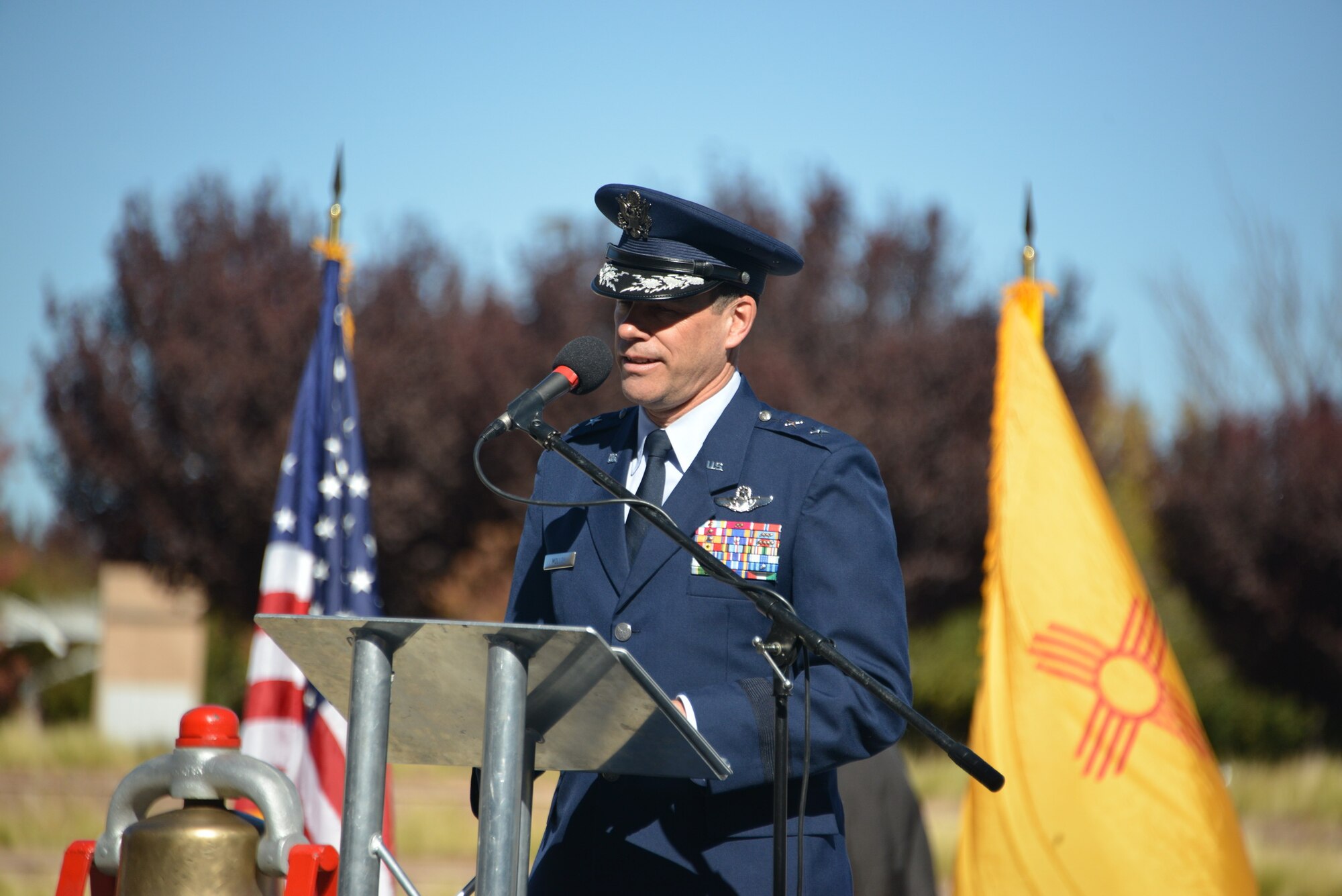 Maj. Gen. Matthew Molloy, Air Force Operational Test and Evaluation Center commander, speaks to the audience at the Veterans Day Ceremony Nov. 11 at the New Mexico Veterans Memorial. Molloy encouraged listeners to strive to serve the country and the community.