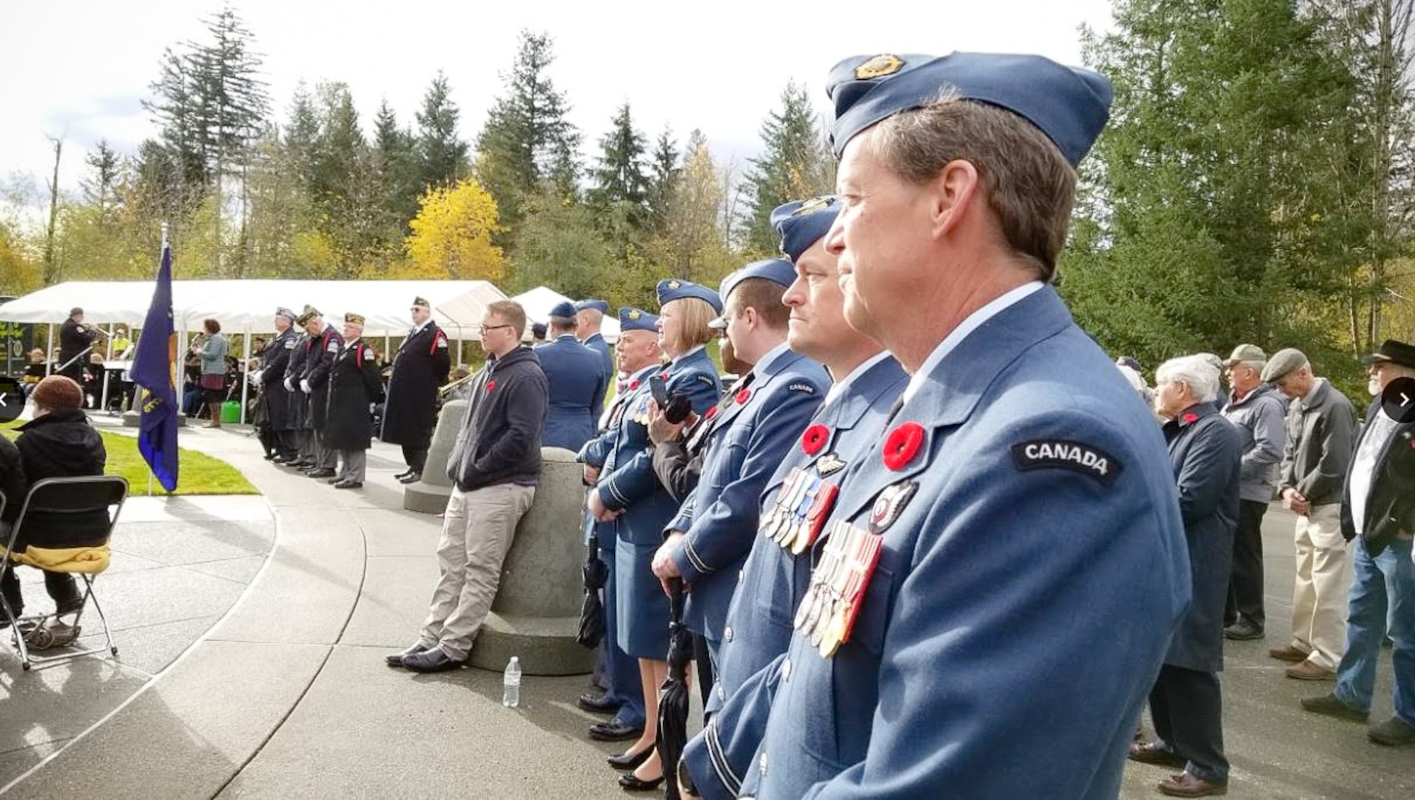 Members of the WADS Canadian Detachment await the beginning of the Veterans Day program at the Tahoma National Cemetery.  Pictured from front to back are: Capt. Todd Rose, Capt. Patrick Morris, Capt. Mark Hynes, Master Seaman Malisa Ogunniya, Capt. Barb Steele and Capt. Jordon Harpe.