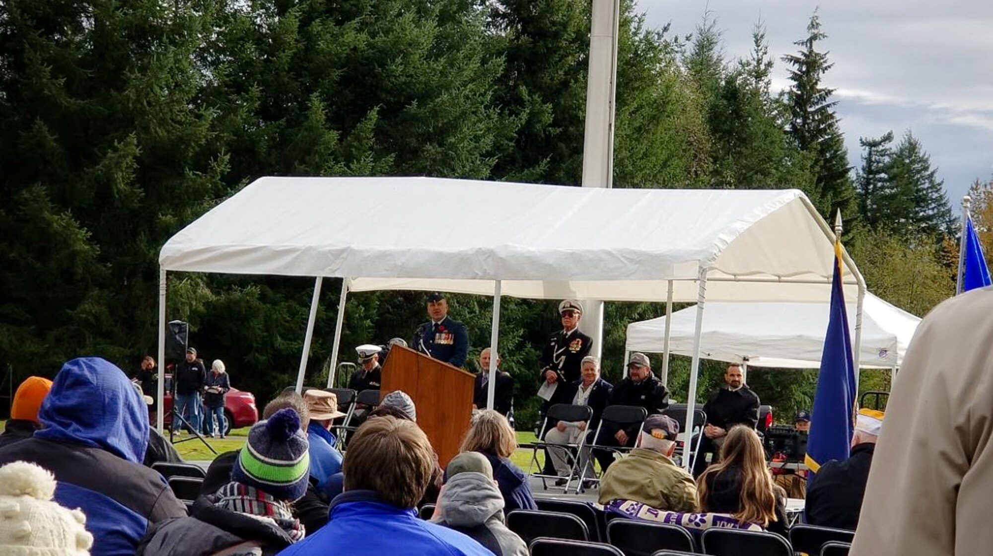 Lt. Col. Matthew Wappler, WADS Canadian Detachment commander, speaks about the Canadian effort during the Korean War and the significance of the poppy flower during the Veterans Day program at Tahoma National Cemetery.