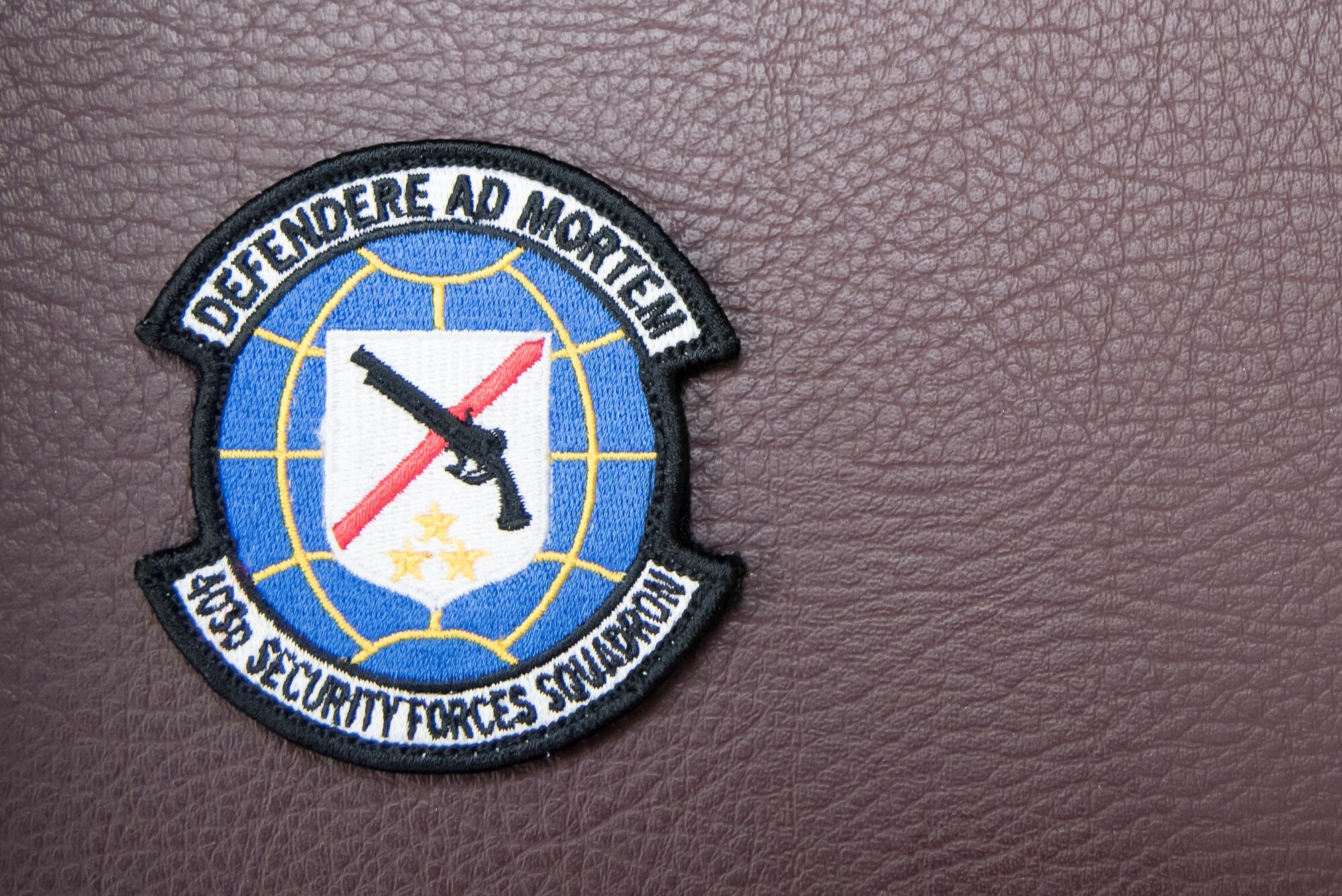 The 403rd Security Forces Squadron unit patch rests on a chair at Keesler Air Force Base, Mississippi Nov. 7, 2017. (U.S. Air Force photo by Staff Sgt. Heather Heiney)