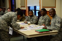 Combined Federal Campaign representatives from the 341st Medical Group provide information and sign-up sheets for members of their group Nov. 14, 2017, at Malmstrom Air Force Base, Mont. Airmen can volunteer to become unit representatives to spread awareness for the CFC. (U.S. Air Force photo by Airman 1st Class Tristan Truesdell)