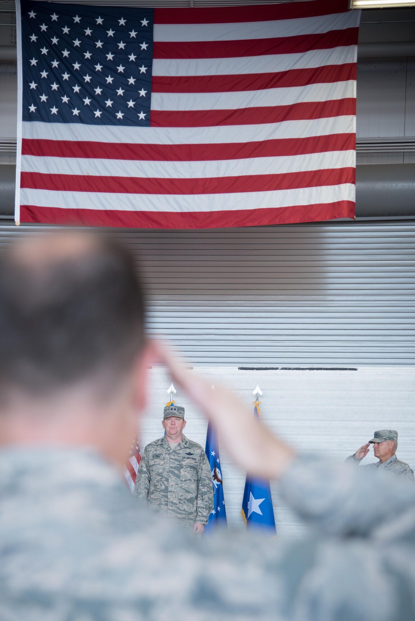 Members of 22nd Air Force salute Maj. Gen. Richard Scobee, Air Force Reserve Command deputy commander, during the 22nd AF change of command ceremony Nov. 14, 2017 at Keesler Air Force Base, Mississippi. (U.S. Air Force photo by Staff Sgt. Heather Heiney)