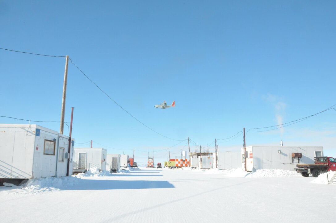 LC-130 Skibird flies over McMurdo Station