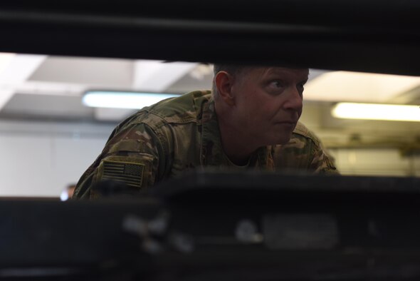 U.S. Air Force Brig. Gen. Kyle Robinson, 332nd Air Expeditionary Wing commander, inspects a piece of A-10 Thunderbolt II equipment with deployed Airmen from the 447th Expeditionary Aircraft Maintenance Squadron Nov. 7, 2017, at Incirlik Air Base, Turkey.