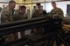 Airmen from the 447th Expeditionary Aircraft Maintenance Squadron and U.S. Air Force Brig. Gen. Kyle Robinson, 332nd Air Expeditionary Wing commander, inspect a 30 millimeter GAU-8 Avenger seven-barrel Gatling Gun undergoing repairs Nov. 7, 2017, at Incirlik Air Base, Turkey.