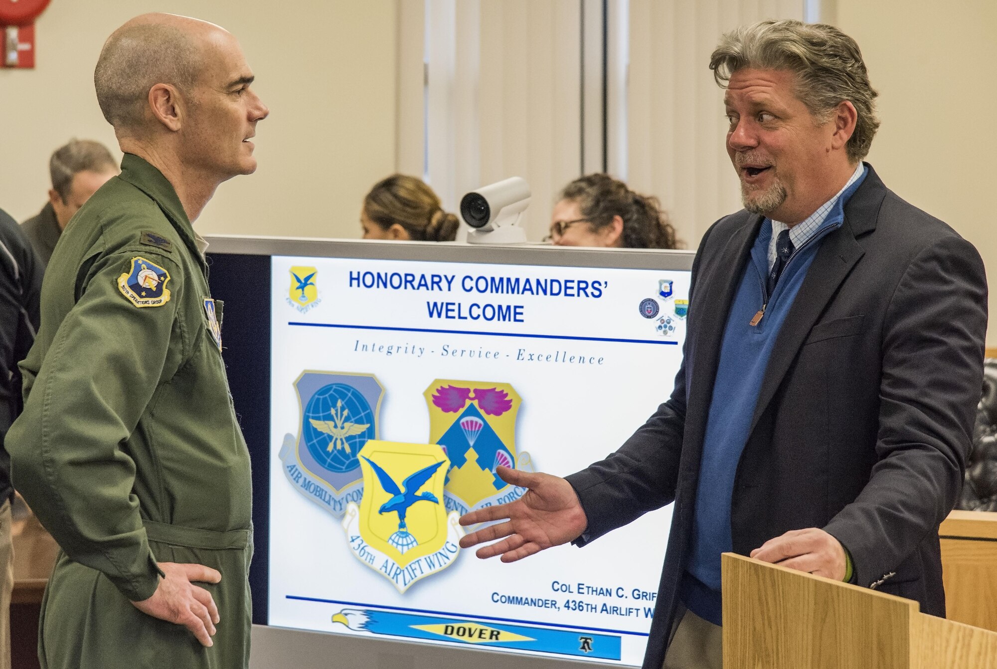 Col. William Gutermuth, 512th Operations Group commander, listens to David Repass, 512th OG honorary commander, prior to their tour of the 436th Airlift Wing Staff Agencies Nov. 8, 2017, on Dover Air Force Base, Del. The honorary commanders received mission briefings, toured various facilities and met with Team Dover WSA members during their half-day tour. (U.S. Air Force photo by Roland Balik)