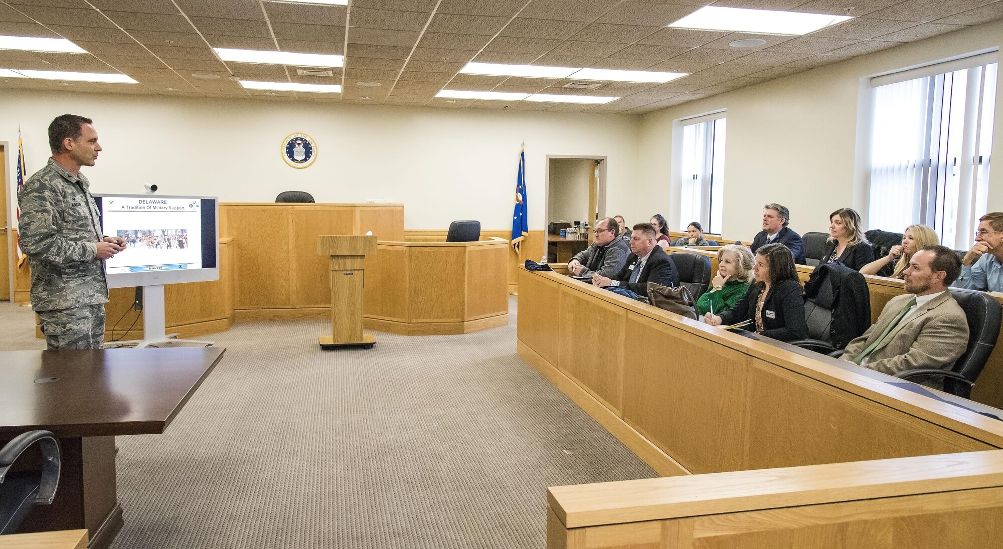 Col. Ethan Griffin, 436th Airlift Wing commander, briefs honorary commanders on the mission of the 436th AW Nov. 8, 2017, on Dover Air Force Base, Del. The honorary commanders received mission briefings, toured various facilities and met with Team Dover Wing Staff Agencies members during their half-day tour. (U.S. Air Force photo by Roland Balik)