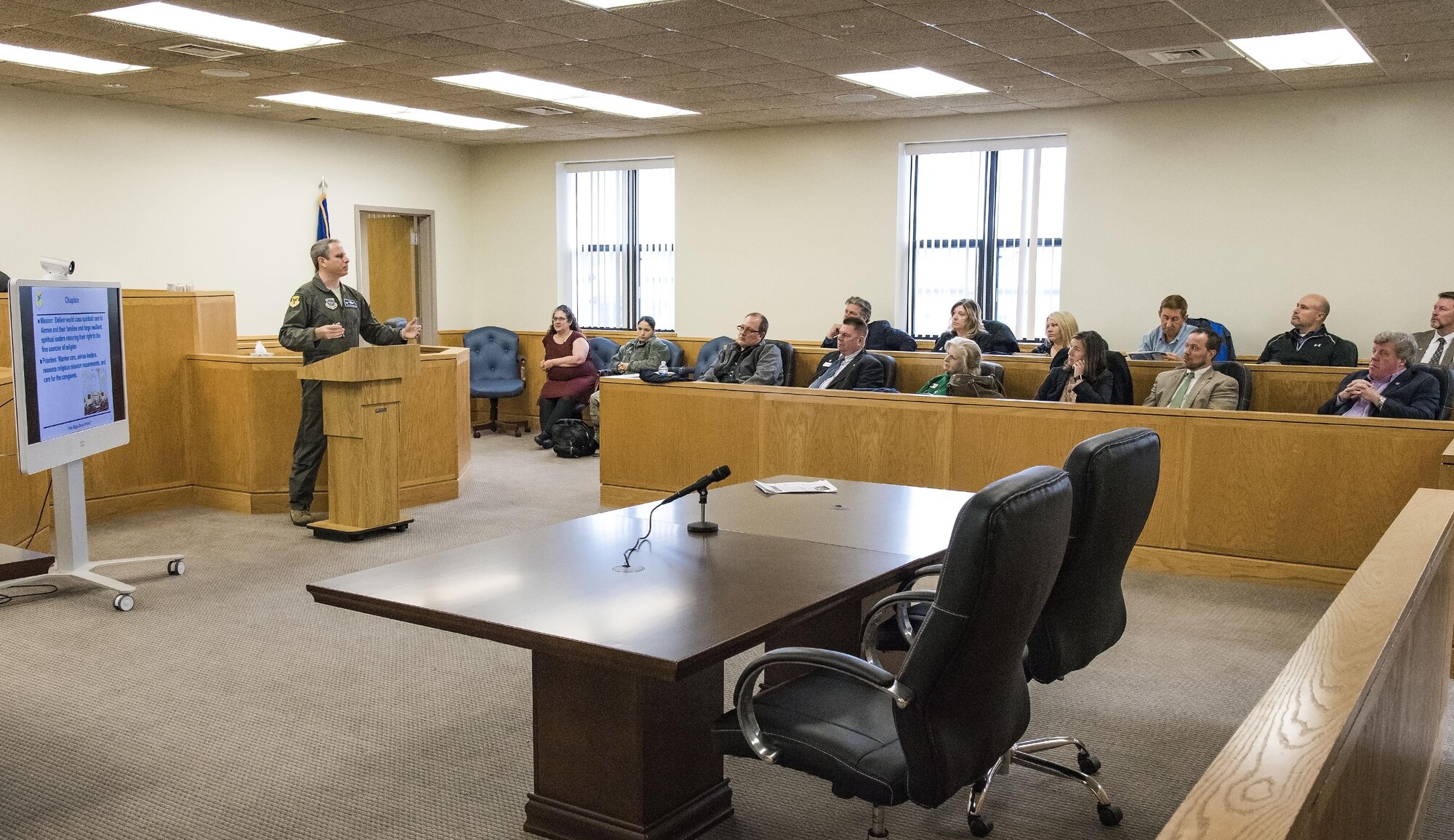 Lt. Col. Timothy Williams, 436th Airlift Wing director of staff, briefs Team Dover honorary commanders on his role and duties as the DS Nov. 8, 2017, on Dover Air Force Base, Del. In the Staff Judge Advocate court room, 20 honorary commanders were briefed on the mission of each wing staff agency under the 436th AW. (U.S. Air Force photo by Roland Balik)