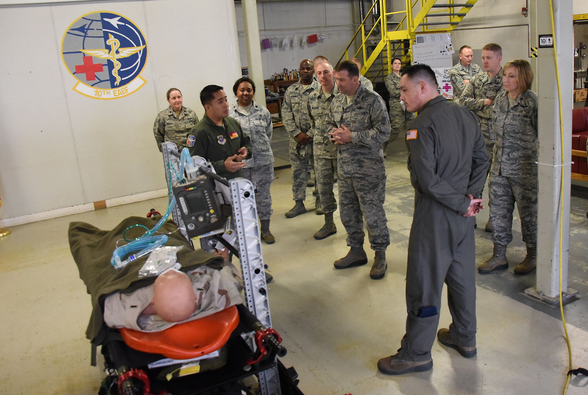Airmen with the 313th Expeditionary Operations Support Squadron brief Maj. Gen. Christopher Bence, commander, USAF Expeditionary Center and Command Chief Master Sgt. Larry Williams, USAF EC command chief, on how they care for aeromedical evacuation patients at Ramstein Air Base, Germany, Nov. 2, 2017. Bence and Williams along with the 521st Air Mobility Operations Wing leadership team visited six squadrons of the 521st AMOW at Ramstein AB and Spangdahlem AB, Germany, Aviano AB, Italy and RAF Mildenhall, U.K. (U.S. Air Force photo by Tech. Sgt. Jamie Powell)