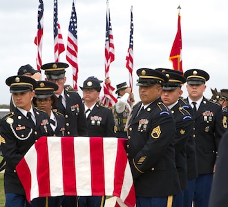 Soldiers of the Military Funeral Honors Caisson Detachment here carry the casket bearing the remains of Gen. Richard E. Cavazos to the assembly area during Caisson Funeral Honors (Fallen Stars) for Cavazos at the Fort Sam Houston National Cemetery, Nov. 14.