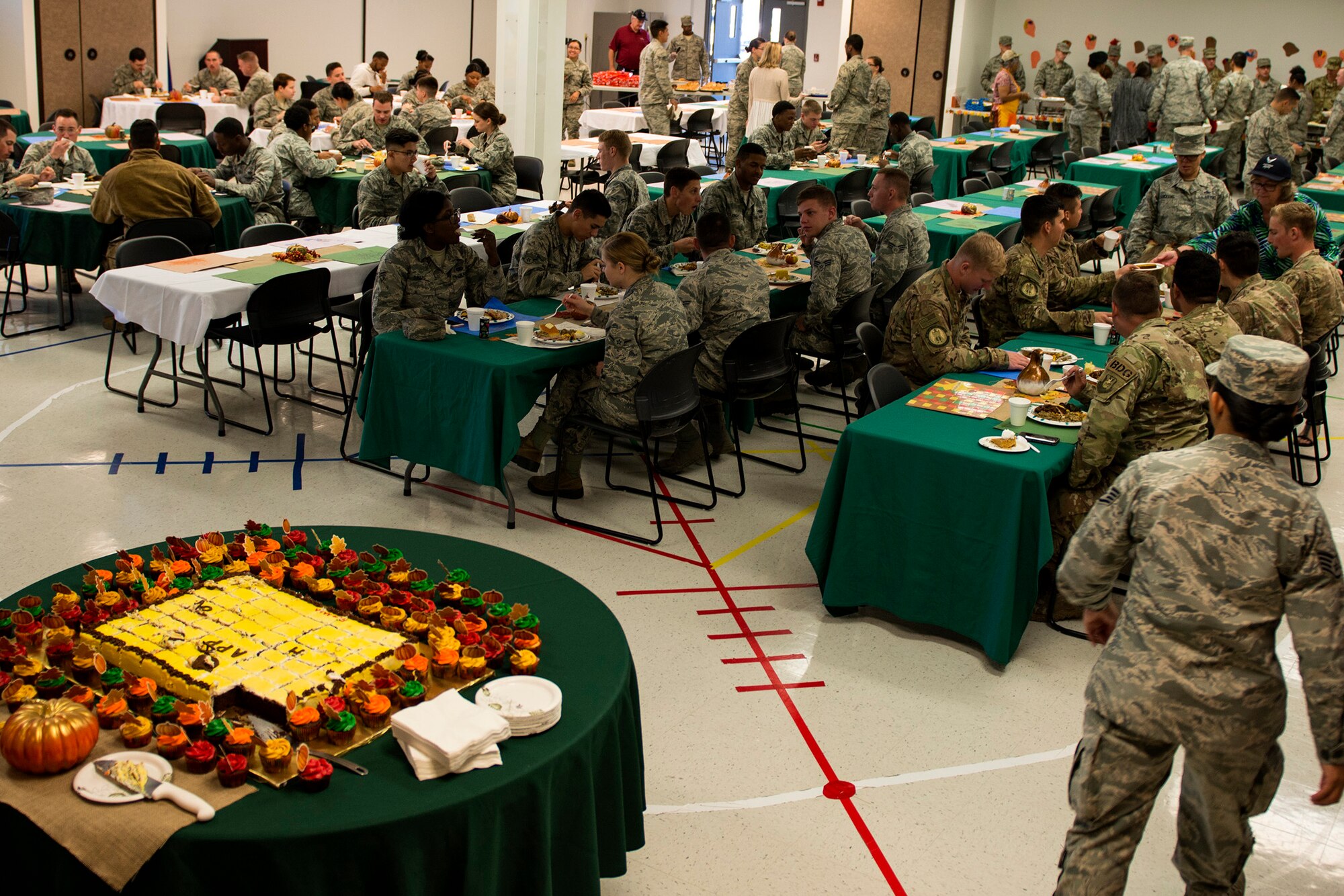 Airmen and their families eat during the Annual Airmen’s Thanksgiving luncheon, Nov. 14, 2017, at Moody Air Force Base, Ga. Moody Chiefs Group, with the support of various base organizations, held the luncheon because many Airmen are unable to return home for Thanksgiving. (U.S. Air Force photo by Airman 1st Class Erick Requadt)