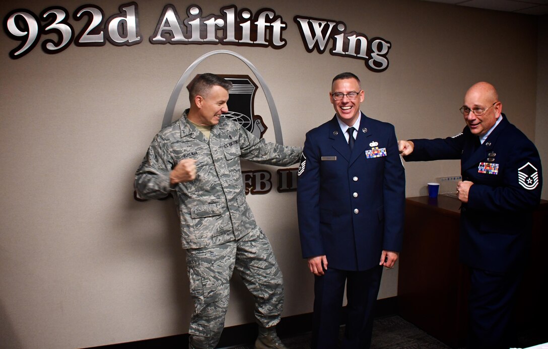 Mentors help congratulate new master sergeant