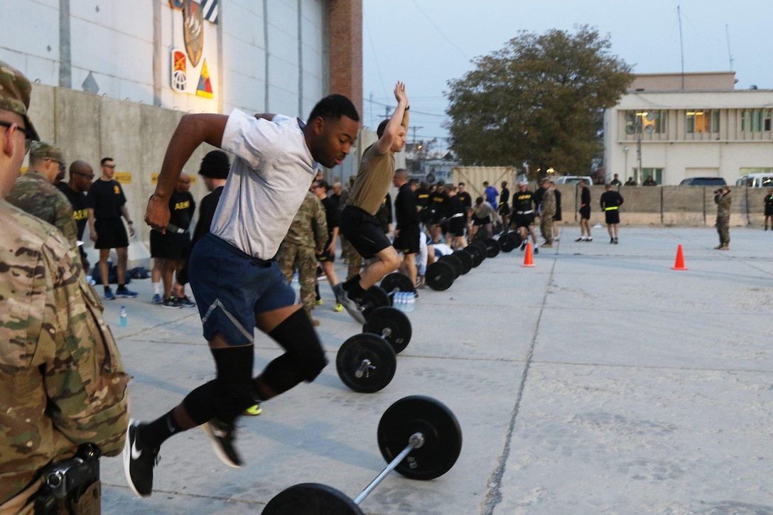 Soldiers play leap frog during Marne Week.