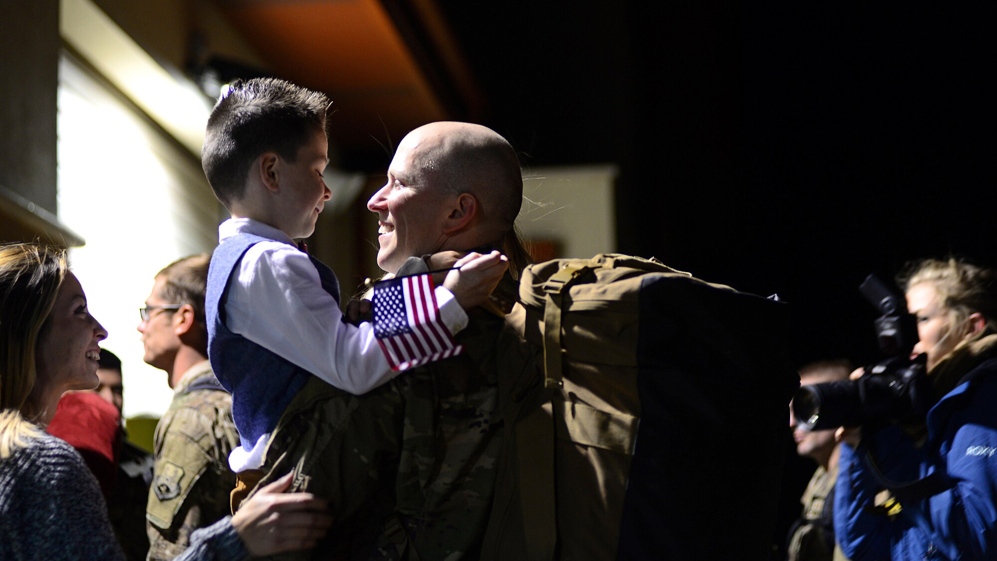 An Airman greets his son at Aviano Air Base, Italy, Nov. 6, 2017. The Airman was one of 380 Airmen and who were deployed to Bagram Air Field, Afghanistan to support of Operation Freedom’s Sentinel. (U.S. Air Force photo by Airman 1st Class Ryan Brooks)