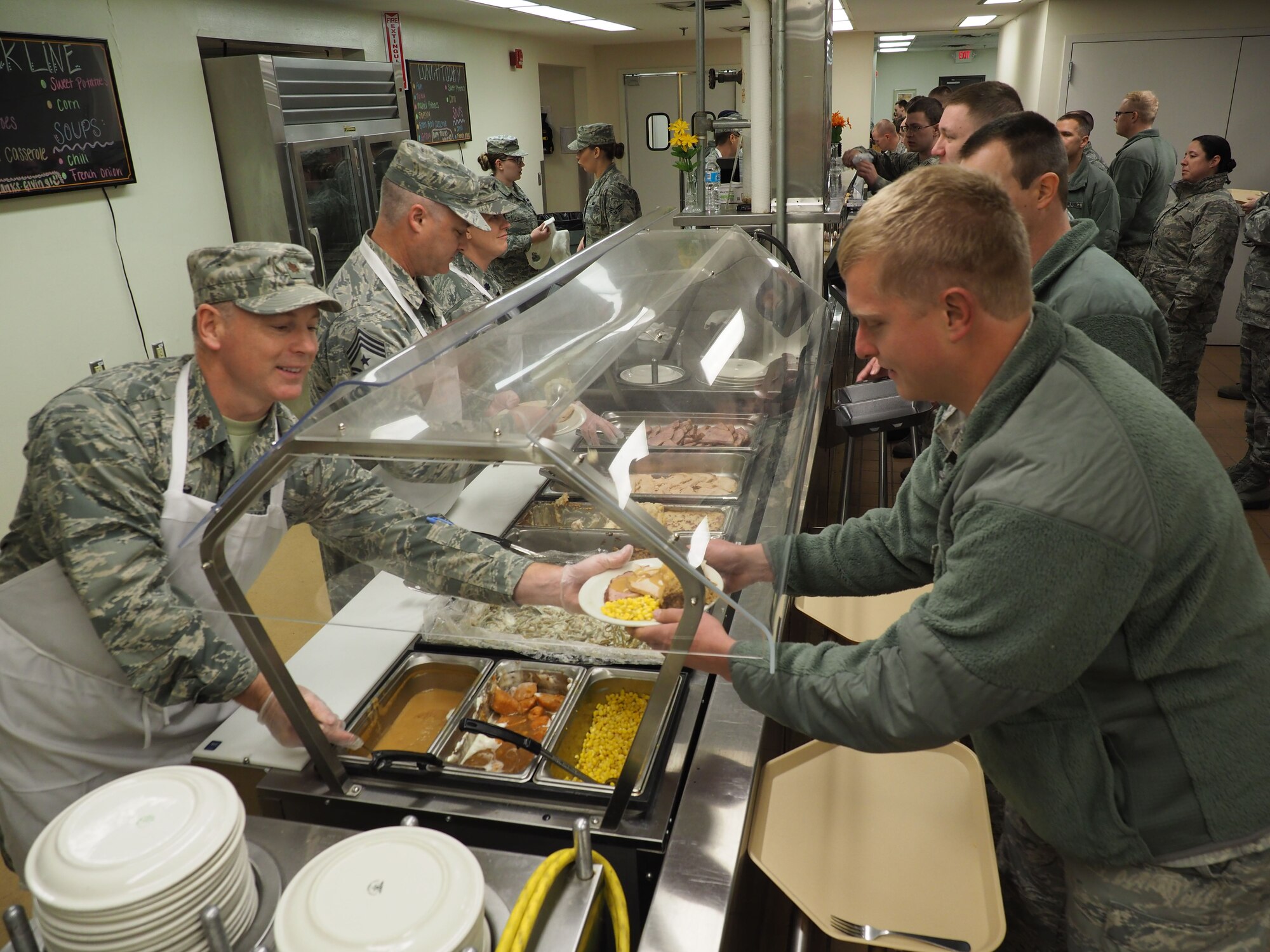 934th Airlift Wing leaders serve up a hearty Thanksgiving meal to Airmen during the November UTA. (Air Force Photo/Paul Zadach)