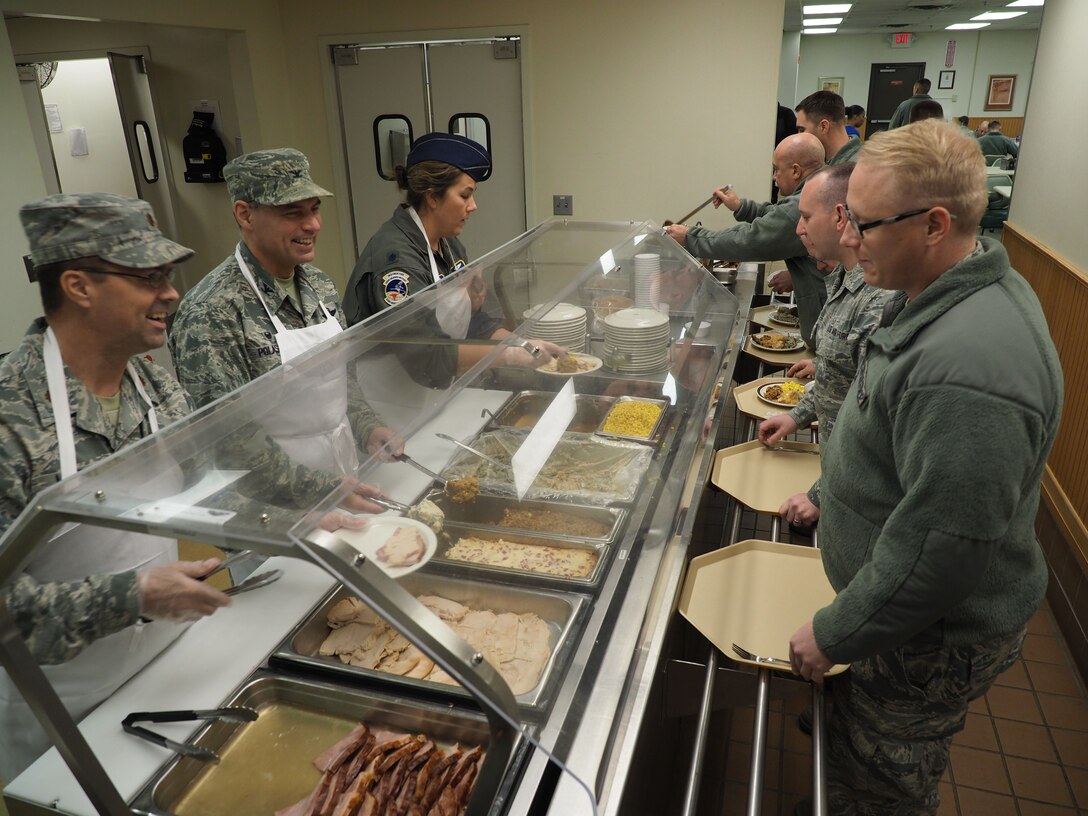 934th Airlift Wing leaders serve up a Thanksgiving meal to Airmen during the November UTA. (Air Force Photo/Paul Zadach)