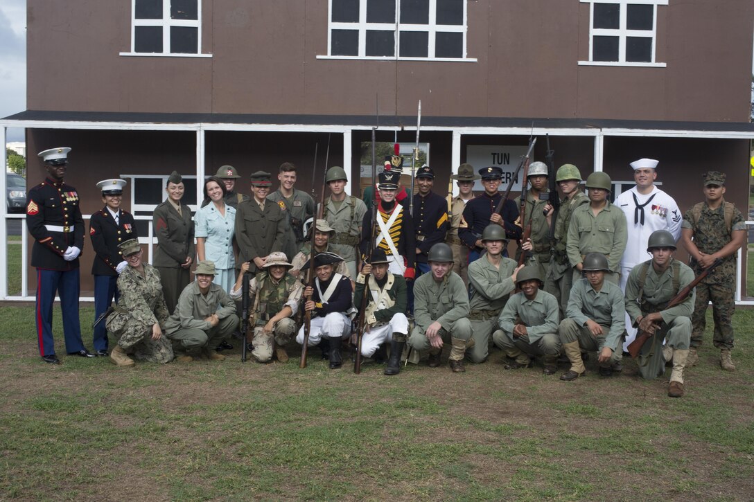 Participants of the U.S. Marine Corps birthday pageant pose for a photo, Marine Corps Base Hawaii, Nov. 9, 2017. The birthday pageant celebrates the birthday of the Marine Corps and pays homage to the rich legacy of the Corps. (U.S. Marine Corps photo by Lance Cpl. Luke Kuennen)