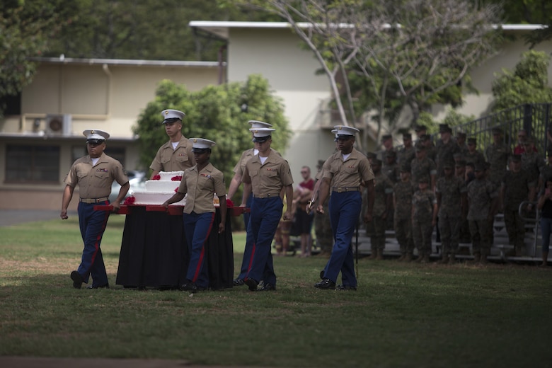 U.S. Marines prepare for the cake-cutting ceremony during the U.S. Marine Corps birthday pageant, Marine Corps Base Hawaii, Nov. 9, 2017. The birthday pageant celebrates the birthday of the Marine Corps and pays homage to the rich legacy of the Corps. (U.S. Marine Corps photo by Lance Cpl. Luke Kuennen)