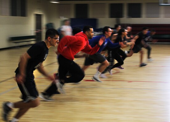 Members of the 47th Flying Training Wing Staff Agencies race to center court in a game of dodgeball to build team cohesiveness at the Losano Fitness Center at Laughlin Air Force Base, Texas, Nov. 14, 2017. Laughlin Wing Staff Agencies gathered for a day devoted to wingmanship and resiliency. (U.S. Air Force photo/Airman 1st Class Anne McCready)