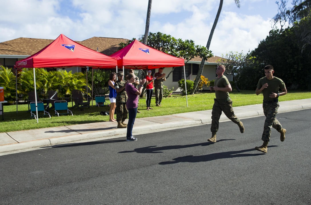 U.S. Marines with Marine Aircraft Group 24 run a total of 242 miles in conjuction with 1st Marine Air Wing in honor of the Marine Corps Birthday, Marine Corps Base Hawaii, Kaneohe Bay, Nov. 6, 2017. The U.S. Marine Corps celebrates it's 242nd birthday this year. (U.S. Marine Corps photo by Sgt. Ricky Gomez)