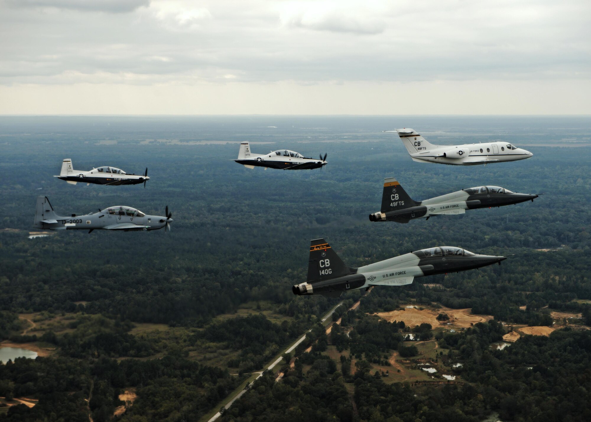 An aircraft from each of the 14th Flying Training Wing flying squadrons were represented in a dissimilar formation in the vicinity of Columbus Air Force Base, Mississippi Oct. 1, 2015.