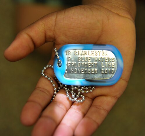 Dog tags are given to kids participating in the youth deployment line at Joint Base Charleston – Weapons Station, S.C., Nov. 4, 2017.