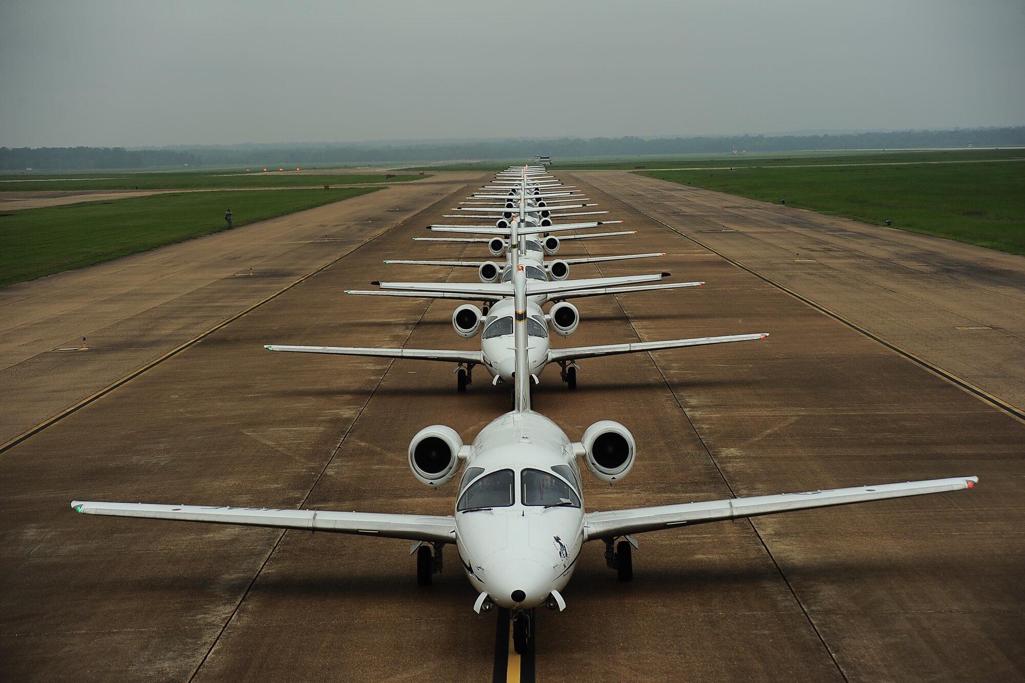 The 14th Flying Training Wing conducts a mass launch of 12 T-1A Jayhawks to practice the combat capability of safely and swiftly launching a large number of aircraft, Aug. 24, 2015.