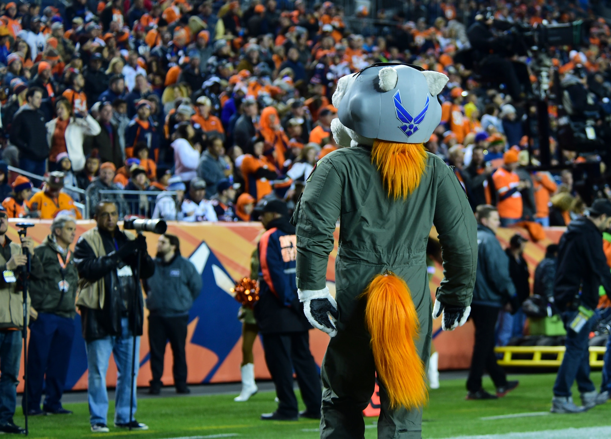 Miles, the Denver Broncos’ mascot, pumps up the crowd in his Air Force flight suit during the a Salute to Service game Nov. 12, 2017, at Sports Authority Stadium at Mile High in Denver.