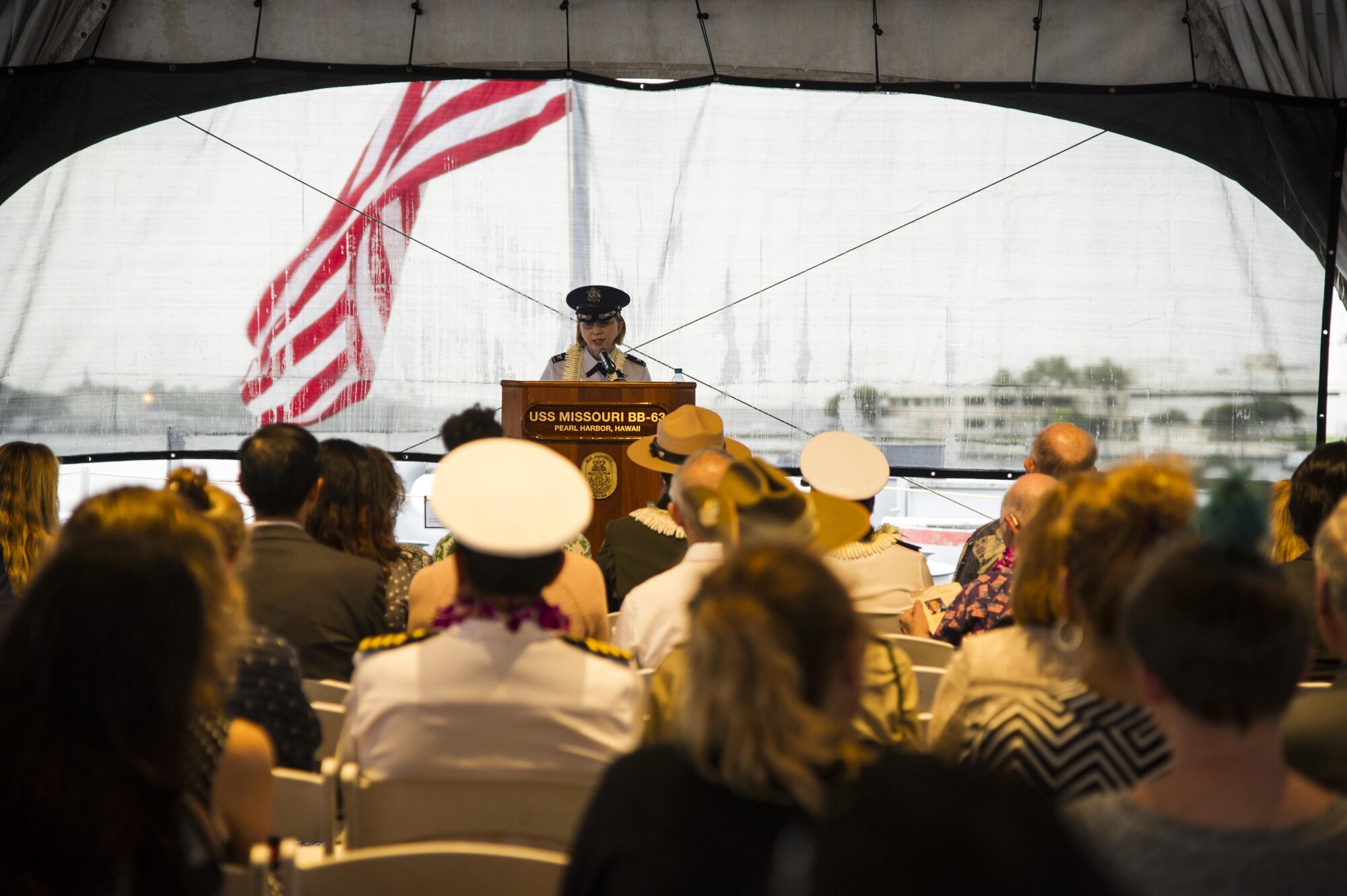 U.S. Air Force Col. Kara Gormont, 15th Medical Group commander, gives the keynote speech during the Veterans Day Sunset Ceremony aboard the USS Missouri Memorial at Ford Island, Hawaii, Nov. 11, 2017. This year’s ceremony honored America’s military veterans and highlighted the contributions of female veterans throughout the generations. (U.S. Air Force photo by Tech. Sgt. Heather Redman)