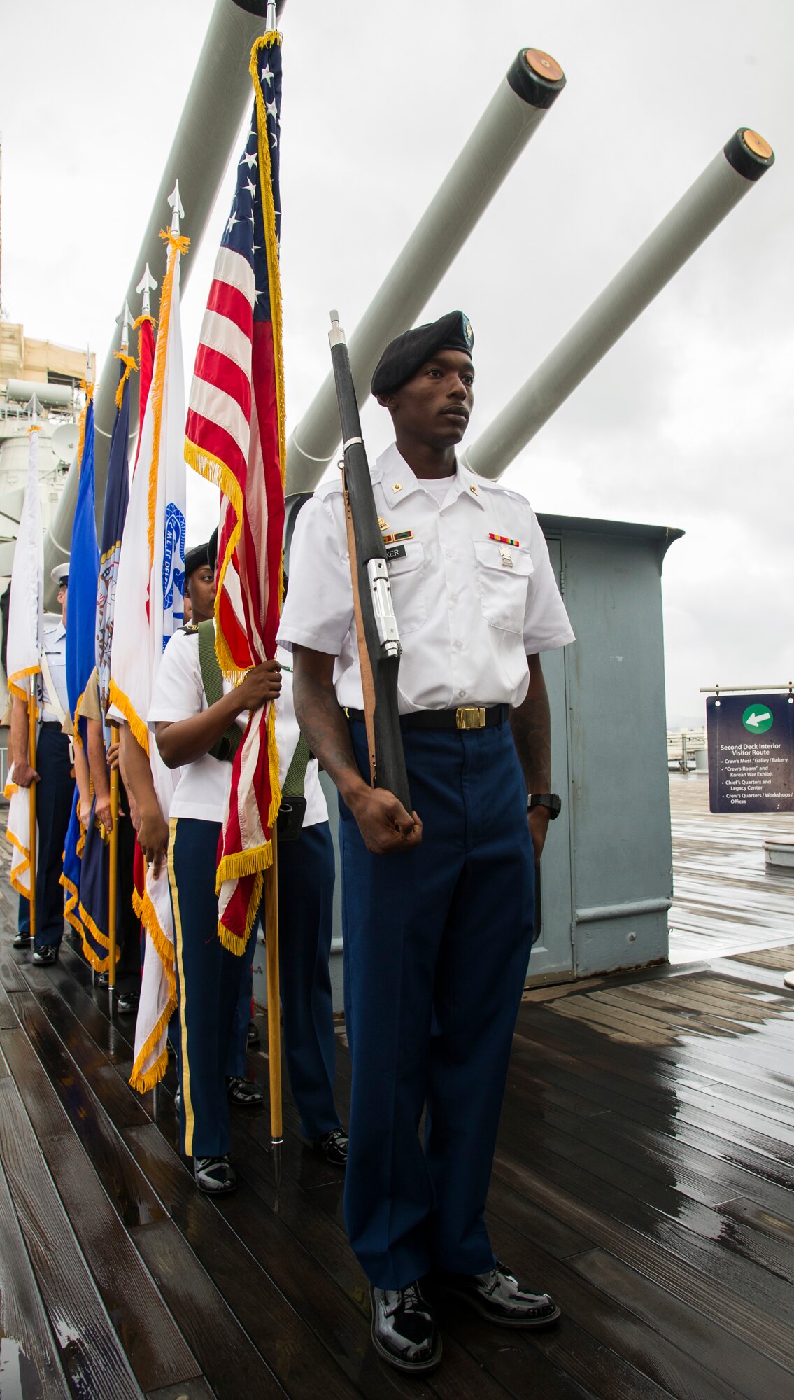 Joint Service Color Guard prepares to post the colors during the Veterans Day Sunset Ceremony aboard the USS Missouri Memorial at Ford Island, Hawaii, Nov. 11, 2017. This year’s ceremony honored America’s military veterans and highlighted the contributions of female veterans throughout the generations. (U.S. Air Force photo by Tech. Sgt. Heather Redman)
