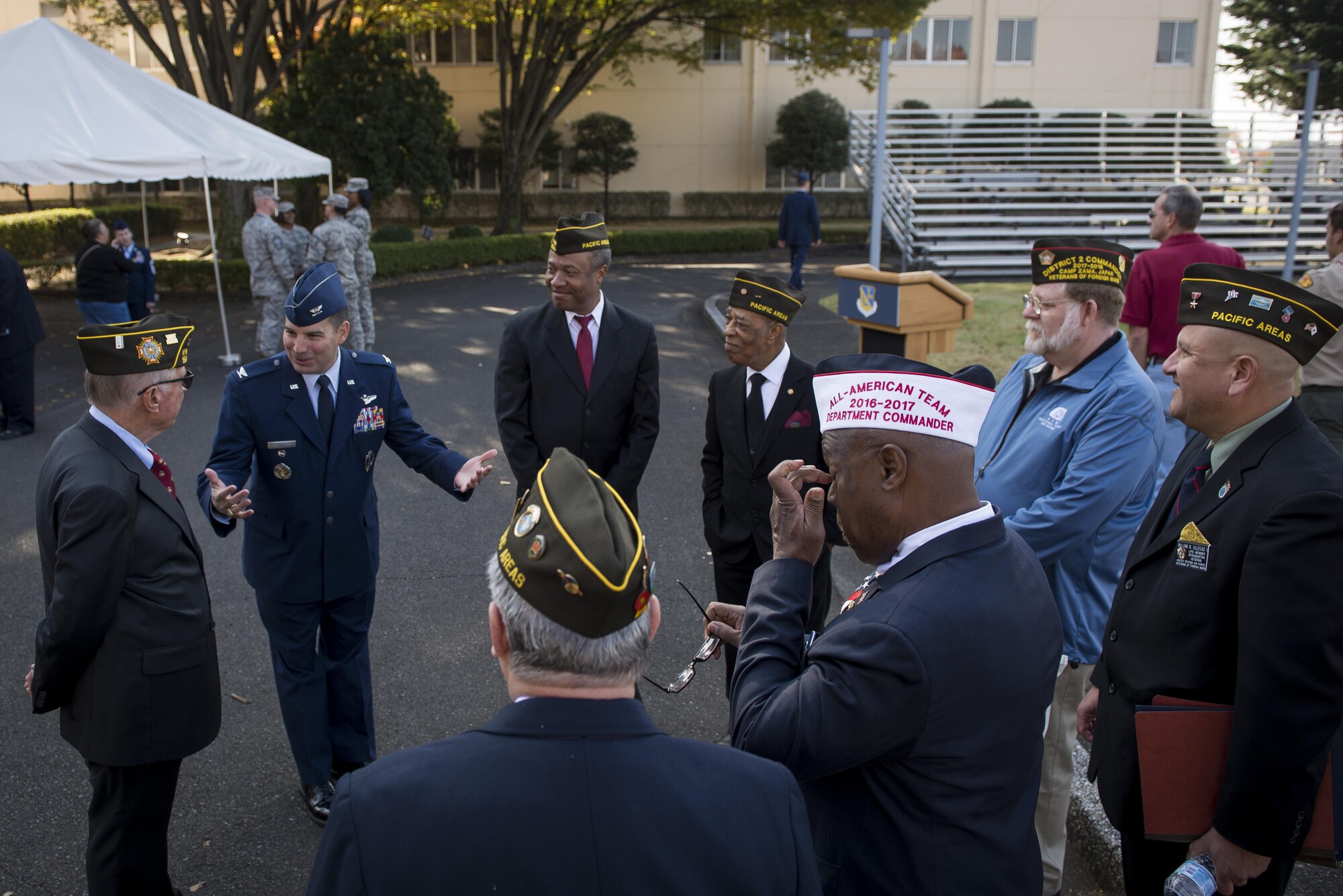 Col. Sergio Vega, 374th Airlift Wing vice commander, speaks with members of the Veterans of Foreign Wars Post 9555 during a Veterans Day Ceremony, Nov. 10, 2017, at Yokota Air Base, Japan.