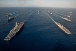 File photo: WATERS SOUTH OF JAPAN (Nov. 23, 2015) The Ronald Reagan Carrier Strike Group (RRNCSG) steams in formation with Japan Maritime Self-Defense Force ships for a photo exercise during Annual Exercise (AE) 16. The 2017 edition of Annual Exercise, a bilateral maritime field training exercise involving the Japan Maritime Self-Defense Force (JMSDF) and U.S. Navy (USN), will be conducted Nov. 16-26. Approximately 14,000 U.S. personnel will participate, as well as the aircraft carrier USS Ronald Reagan (CVN 76).