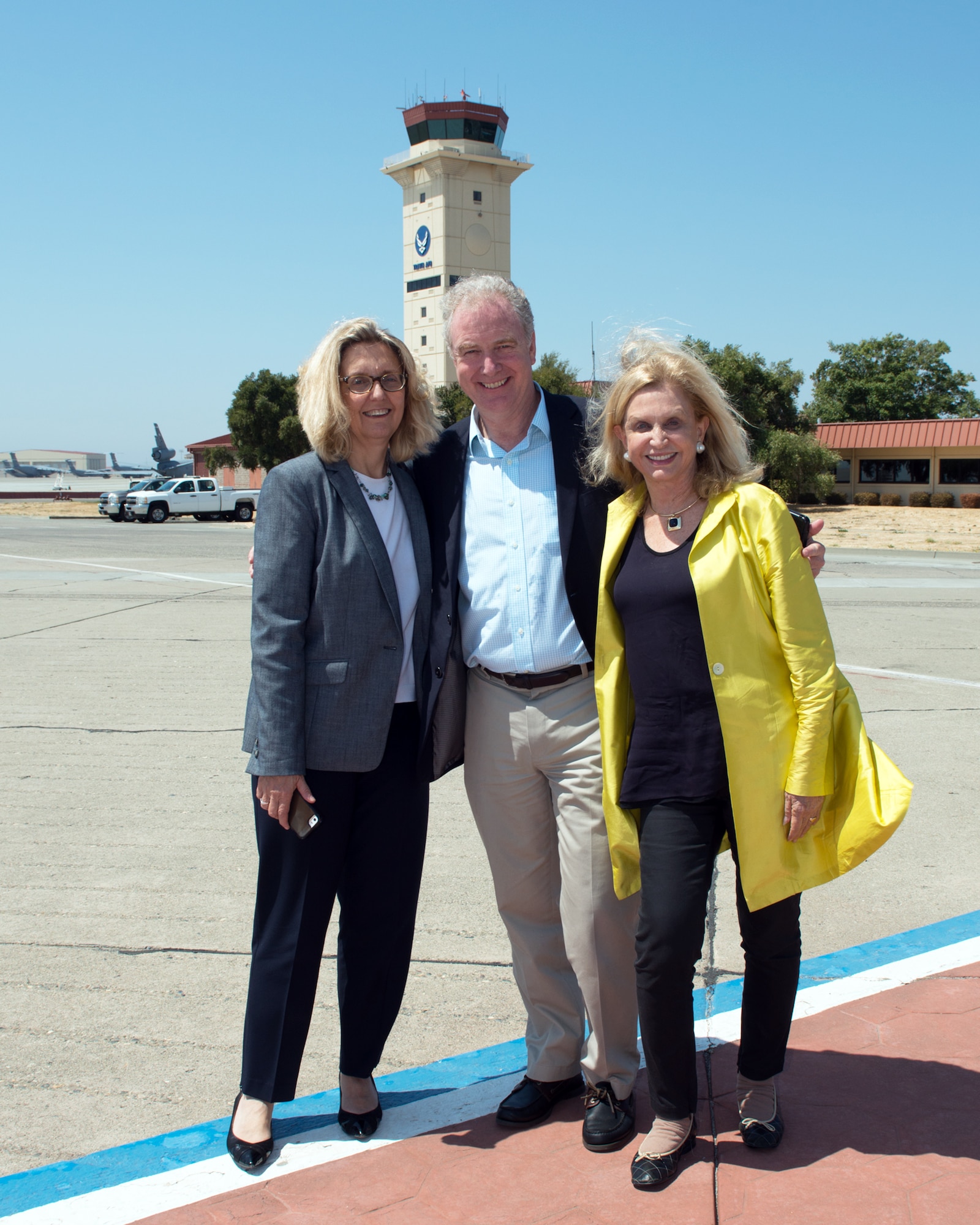 From left Katherine Wilkins, spouse of Chris Van Hollen, U.S. Senator for Maryland, and Congresswoman Carolyn Maloney pose for a photo at Travis Air Force Base, Calif., August 16, 2017. Van Hollen and Maloney are part of a congressional delegation that stopped at Travis en route to Joint Base Pearl Harbor-Hickam. (U.S. Air Force photo by Louis Briscese)