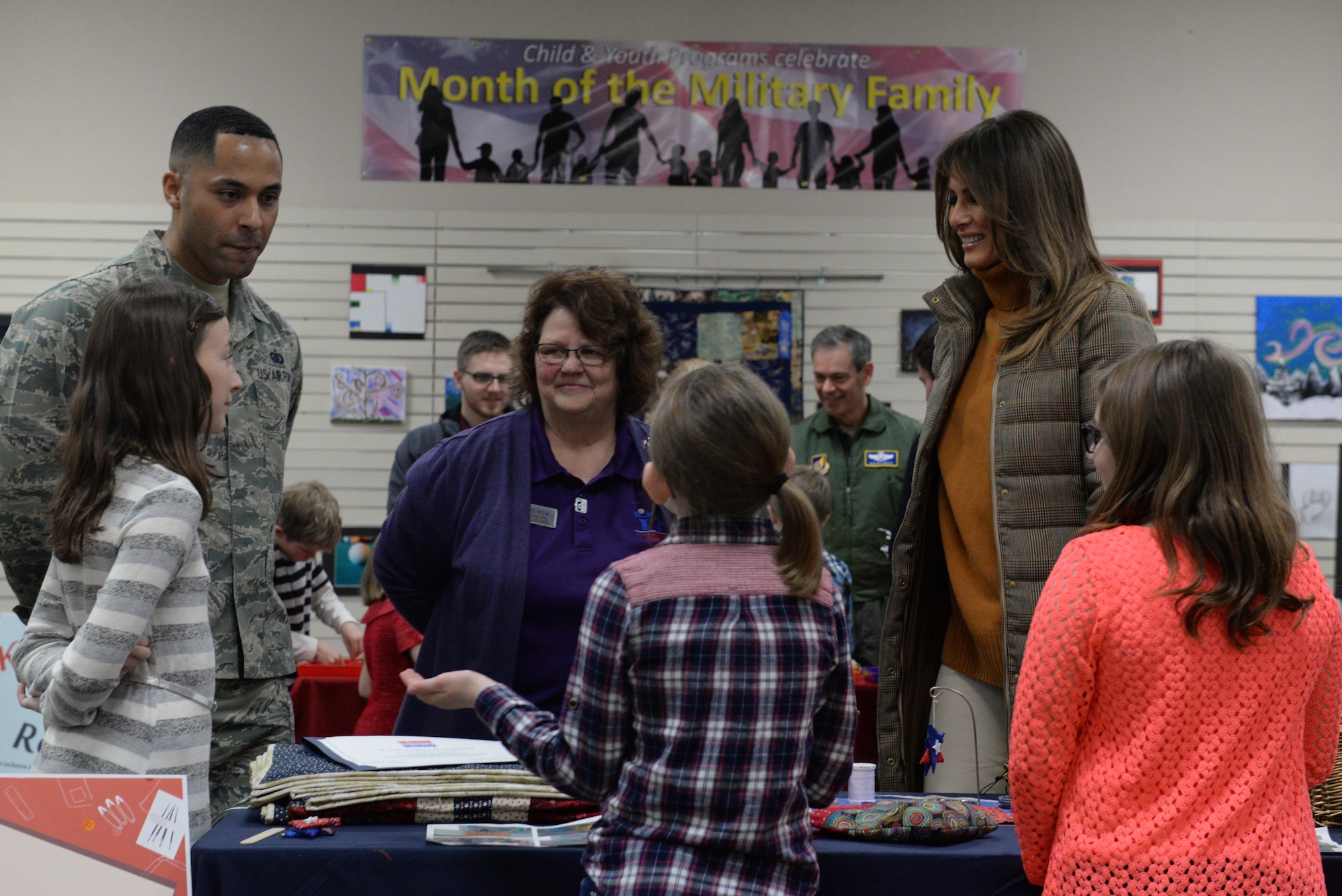 First Lady Melania Trump speaks with children at the Month of the Military Family Celebration event held at the Arctic Oasis on Joint Base Elmendorf-Richardson, Alaska, Nov. 10, 2017. The First Lady was returning from a Pacific Theater tour she attended with President Donald Trump.