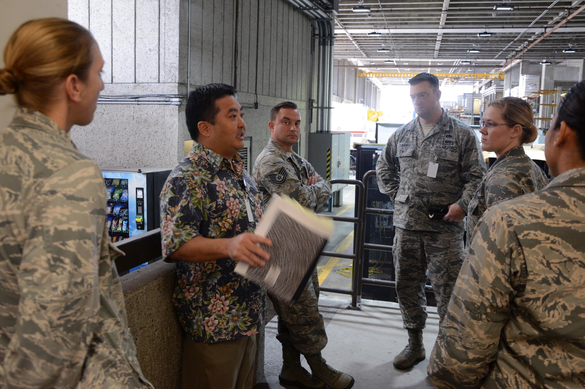 Shane Cuskaden, a Lean Six Sigma black belt at the Hawaiian Electric Company, discusses continuous process improvement related to warehouse process changes as part of a tour to HECO in Honolulu during a Continuous Process Improvement Senior Leaders Course held at Joint Base Pearl Harbor-Hickam, Hawaii, Nov. 7, 2017.