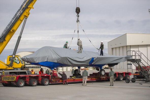 Airmen from the 366th Equipment Maintenance Squadron detach an F-35A Lightning II from a crane Nov. 2, 2017, at Mountain Home Air Force Base, Idaho.  The aircraft was transported from Mountain Home to the F-35 depot at Hill AFB, Utah for repairs. (U.S. Air Force photo by Airman 1st Class Jeremy D. Wolff)