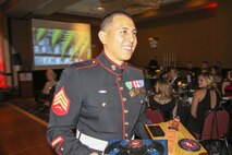 Sgt. Michael Alfaro, recruiter, Recruiting Substation West Omaha, Neb., receives a plaque for winning Marine Corps Recruiting Station Des Moines and 9th Marine Corps District’s Recruiter of the Year at Embassy Suites in Des Moines, Iowa, Nov. 11, during the 242nd Marine Corps Birthday Ball. (Official Marine Corps photo by Sgt. Levi Schultz)