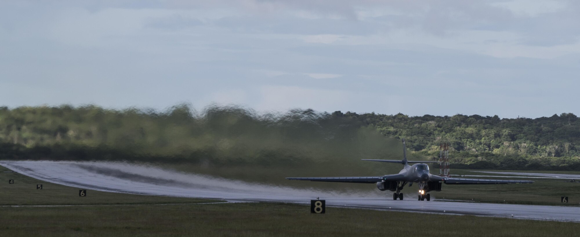 A U .S. Air Force B-l B Lancers assigned to the 37th Expeditionary Bomb Squadron, deployed from Ellsworth Air Force  Base, South Dakota, takes off from Andersen Air Force Base, Guam, Nov. 16, 2017