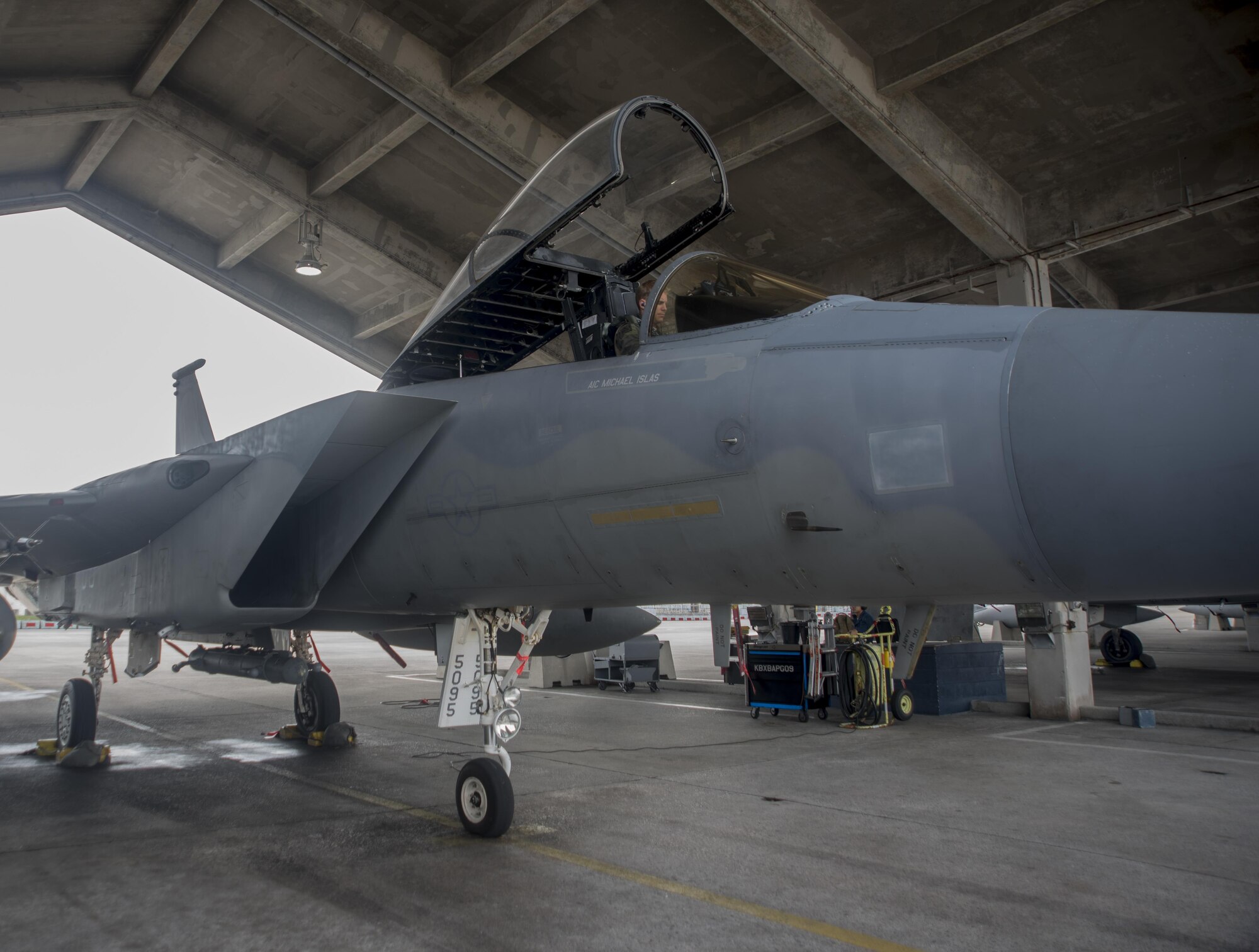 A U.S. Air Force pilot goes through pre-flight inspections on an F-15C Eagle Nov. 16, 2017, at Kadena Air Base, Japan.