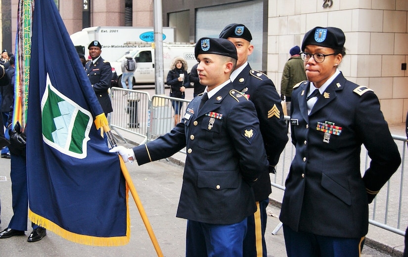 Soldiers of the 3rd Brigade Civil Affairs/Military Information Special Operations, 102nd Training Division, 80th Training Command, prepare to carry the 80th's colors at the New York City Veterans Day parade Nov. 11, 2017.