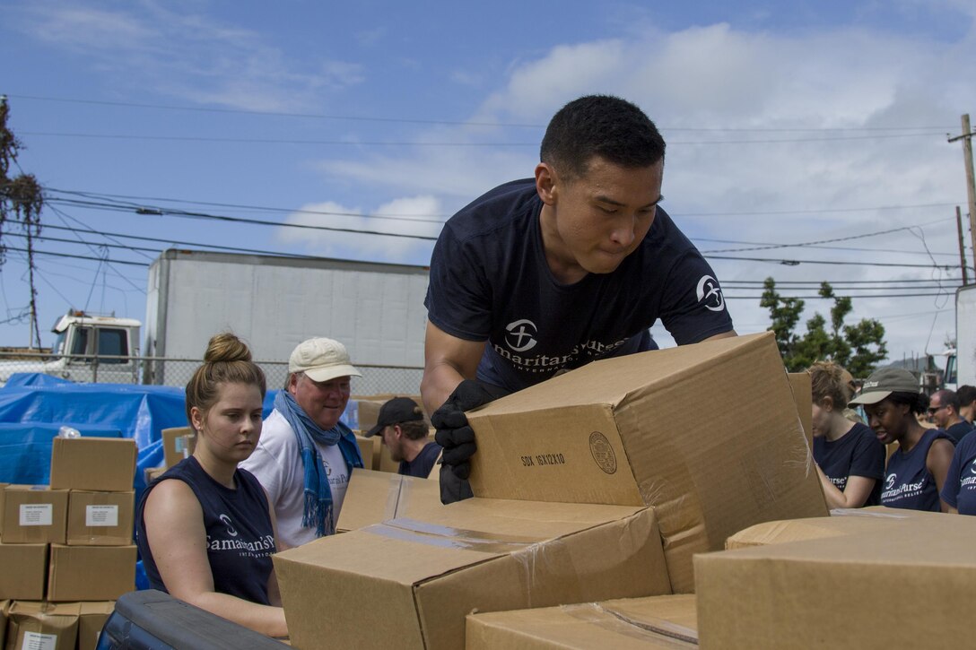 Volunteer Loads Truck