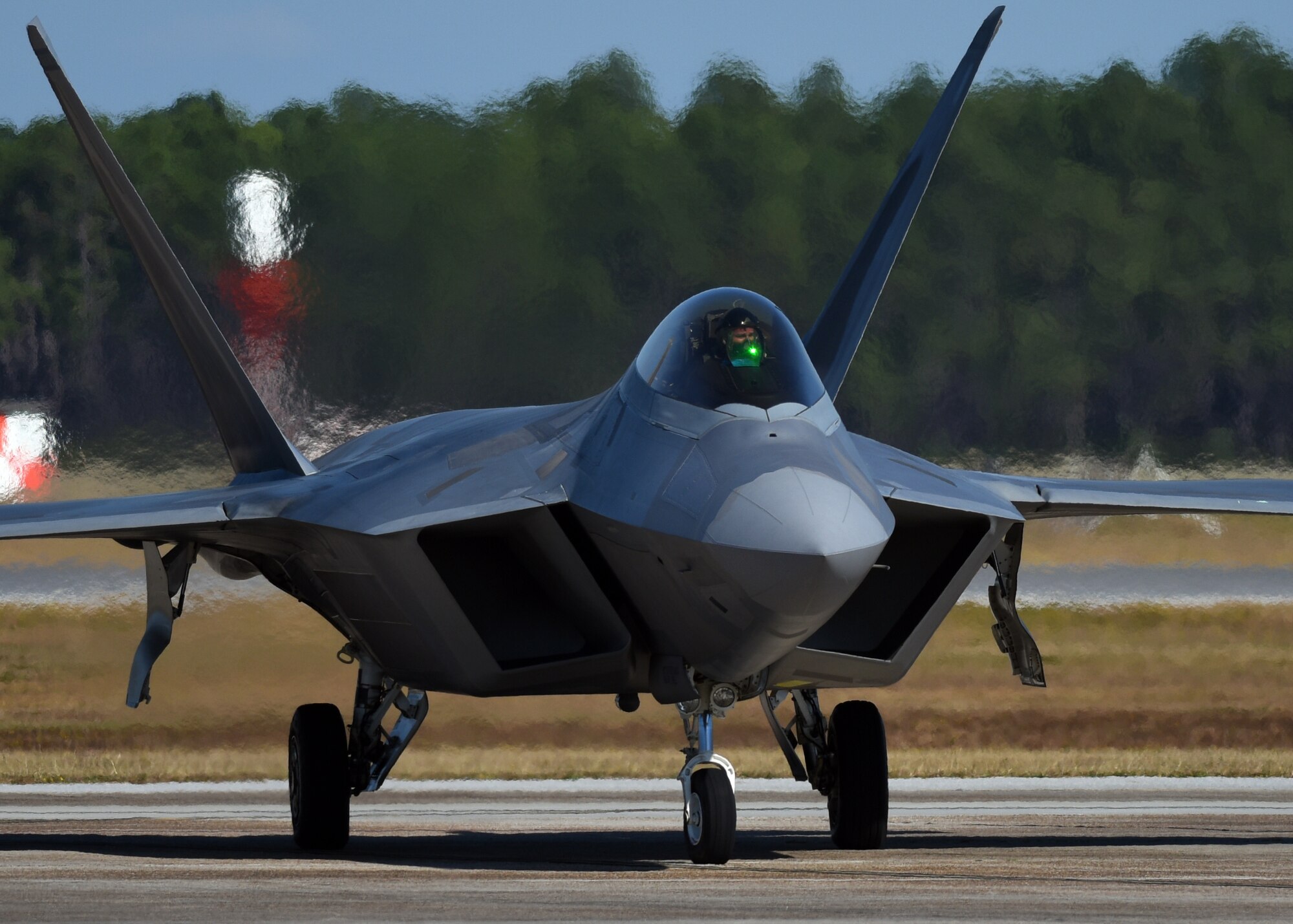 A U.S. Air Force F-22 Raptor from the 525th Fighter Squadron, Joint Base Elmendorf-Richardson, Alaska, taxis down the flightline at Tyndall Air Force Base, Fla., Nov. 3, 2017. The 525th FS F-22 Raptors came to Tyndall to participate in exercise Checkered Flag 18-1 and Combat Archer from Nov. 6-17. (U.S. Air Force photo by Airman 1st Class Isaiah J. Soliz/Released)