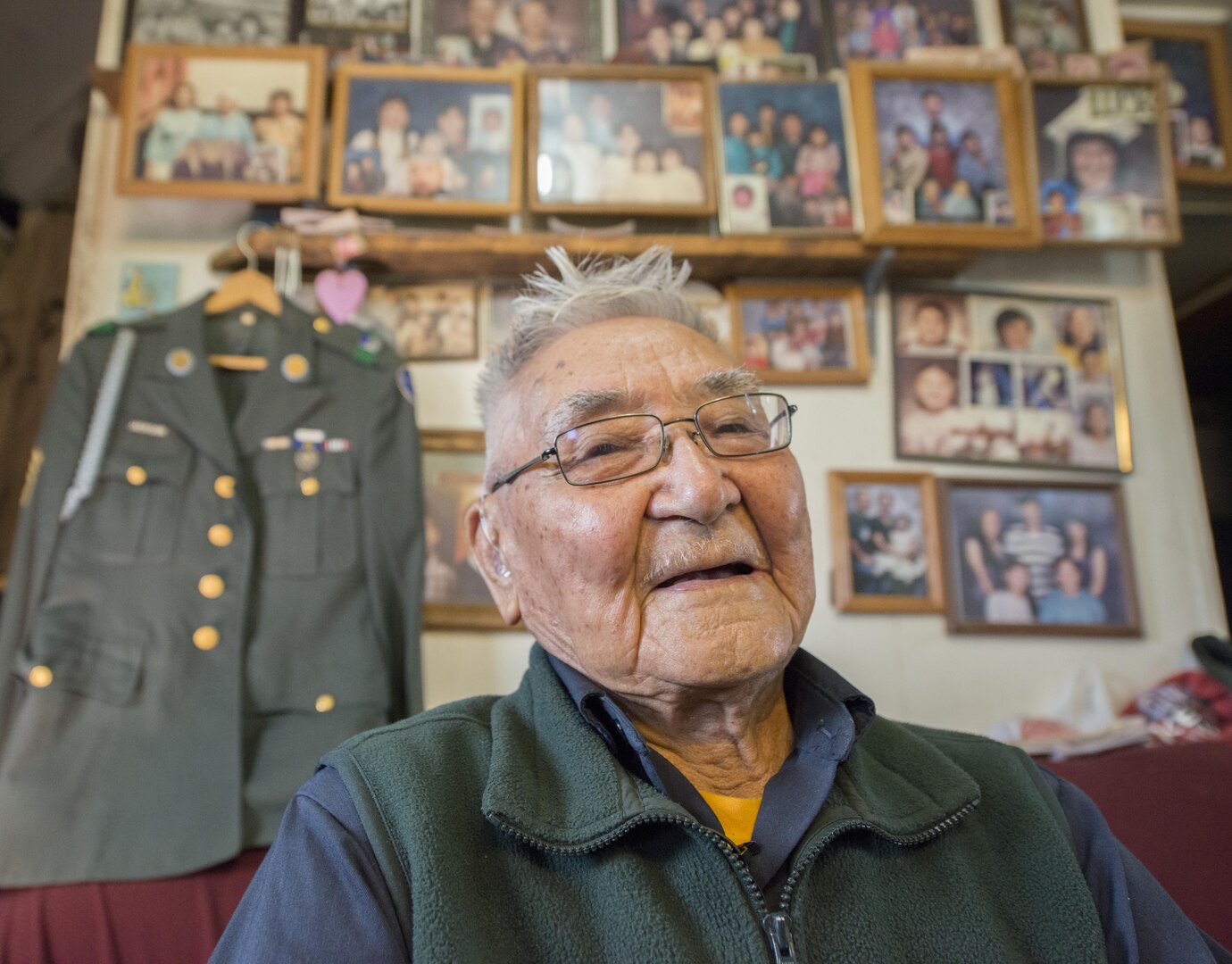 Kwethluk, Alaska - Retired Sgt. 1st Class Sam Jackson, who served in the Alaska Territorial Guard during World War II, poses for a photo inside his home in Kwethluk, Alaska, Sept. 23, 2017.