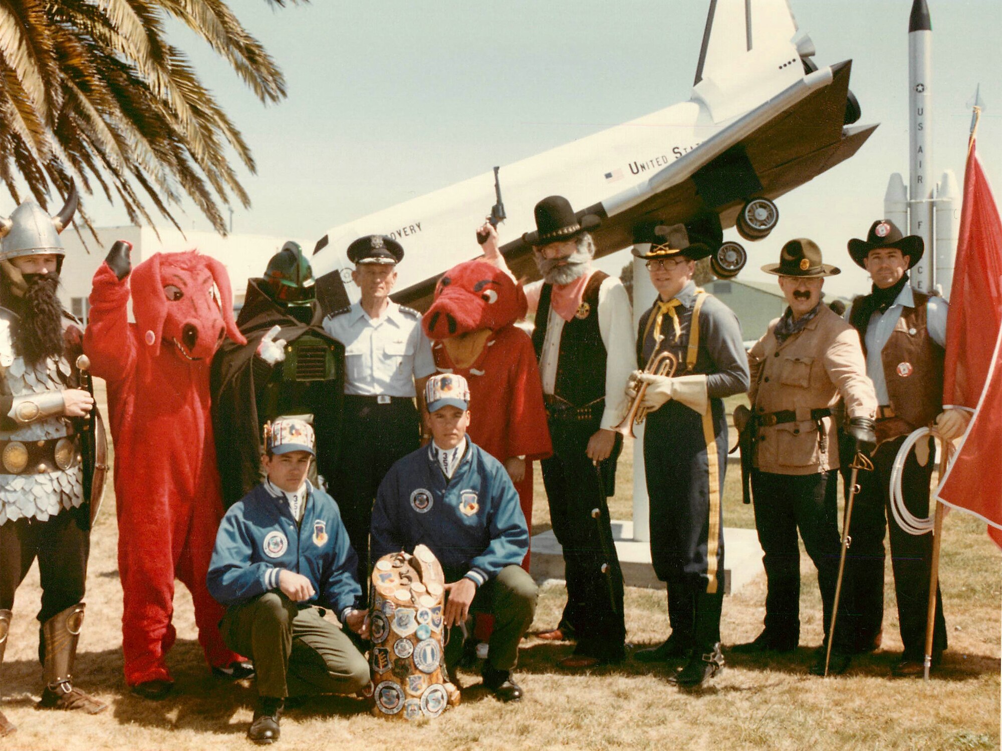 The 341st Strategic Missile Wing’s mascot, the Wrangler, far right, stands with seven other Minuteman and Titan missile wing team mascots around General Bennie L. Davis, commander-in-chief of Strategic Air Command, at the 1985 SAC Missile Combat Competition at Vandenberg Air Force Base, Calif. Malmstrom Air Force Base’s team was called “The Wranglers, “The First Aces” and “The Ace in the Hole Gang” that year. The other mascots represent 321st SMW, Grand Forks AFB, N.D.; 351st SMW, Whiteman AFB, Mo.; 381st SMW, McConnell AFB, Kan.; 308th SMW, Little Rock AFB, Ark.; 44th SMW, Ellsworth AFB, S.D.; 90th SMW, F.E. Warren AFB, Wyo.; and 91st SMW, Minot AFB, N.D. By 1994 the 90th Missile Wing’s mascot changed from a cavalry trooper to the Wrangler. (Photo courtesy of 341st MW Historian Office)