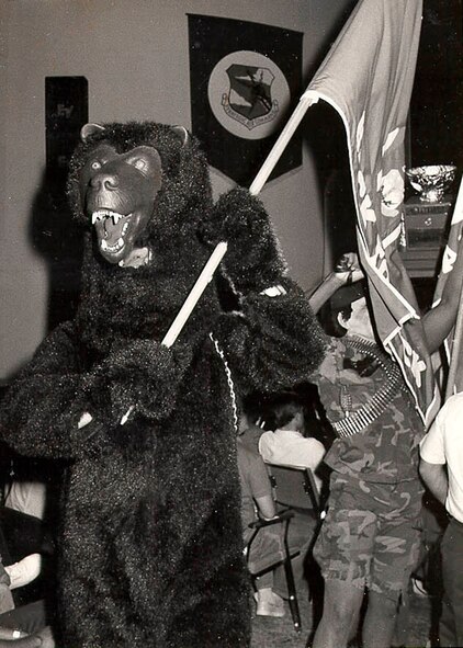 “The Malmstrom AFB, Mont., ‘Bear’ leads the 341st SMW contingent into score posting ceremonies during Olympic Shield ’87” according to the original caption for this photograph. That year marked the 20th anniversary of Strategic Air Command’s first Missile Combat Competition. It was also the only year the name Olympic Shield was used for the competition.  (Photo courtesy of AFGSC Historian Office)