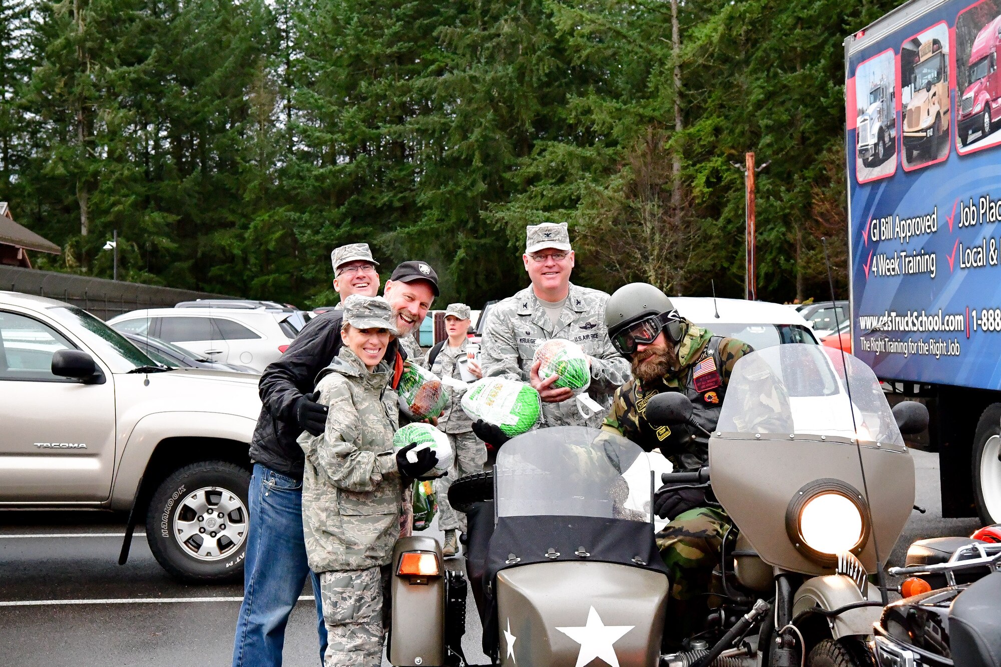 Members of the Combat Veterans Motorcycle Association deliver turkeys to Western Air Defense leadership as part of the 8th annual Operation Turkey Drop Nov. 16, 2017.  Operation Turkey Drop helps ease financial burdens of holiday expenses for Airmen and Soldiers on Joint Base Lewis-McChord and Camp Murray.  The event is made possible by the Association of the United States Army, the Air Force Association and Pierce Military and Business Alliance and dozens of local businesses and organizations.  (U.S. Air National Guard photo by Capt. Kimberly D. Burke)