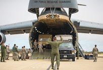 Airmen with the 68th Airlift Squadron unload vehicles from a C-5M Super Galaxy aircraft during exercise Patriot Hook April 26, 2017 at Vandenberg Air Force Base, Calif.